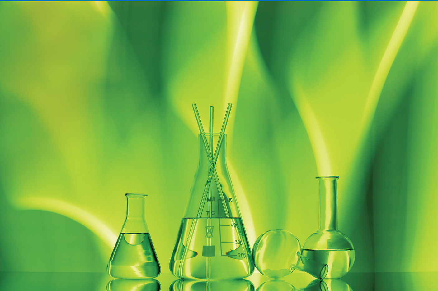 Science beakers with a green background