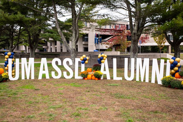UMass Dartmouth alumni sign