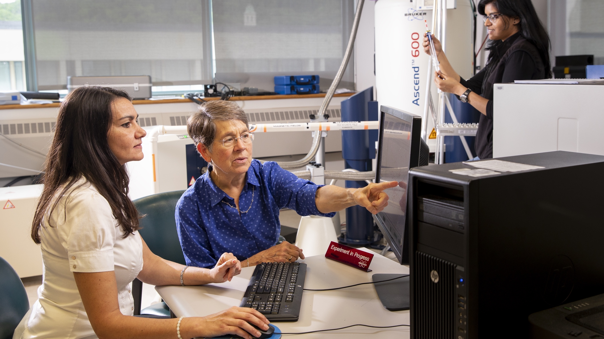 Lila Gierasch (center), professor of biochemistry and molecular biology at UMass Amherst, and colleagues at IALS. Credit: UMass Amherst