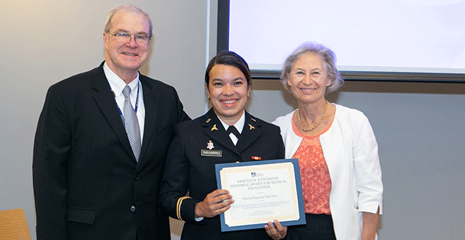 Kristen M. Ettensohn Memorial Award recipient Maria Navarro flanked by Terence R. Flotte, MD, and Michele P. Pugnaire, MD