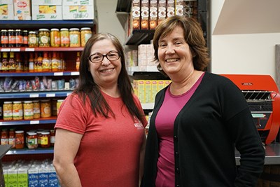Journalist Claudia Lobo, right, at Valentina's Portuguese Market with owner Maria Arseneault.