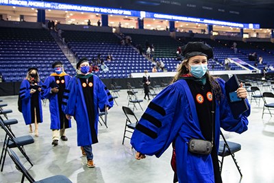 Ph.D. and doctoral graduates from the Classes of '20 and '21 receive their diplomas.