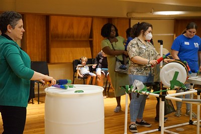 Music Assoc. Prof. Elissa Johnson-Green leads campers in a rhythm exercise.