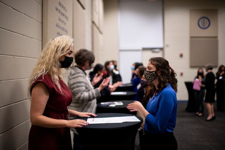 Industry professionals speed network with students during the Empowering Women in Science and Engineering event on Tuesday, October 26, 2021.