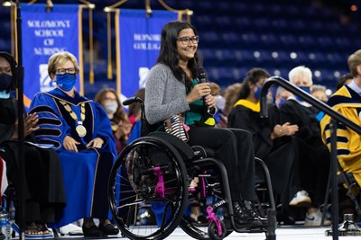 Computer engineering alum Sanskriti Sharma '20 tells students about her team's winning DifferenceMaker project Wonder Wheel during this fall's Convocation ceremony at the Tsongas Center.