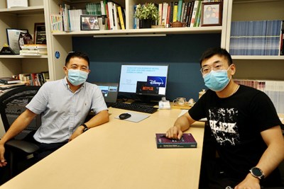 Assoc. Prof. Sunny Li Sun, left, and Ph.D. candidate William Zhou are researching how new ventures with subscription-based business models are better able to withstand a crisis like the pandemic.