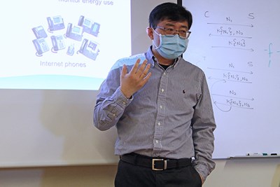 Professor Benyuan Liu of the Department of Computer Science gives students an overview of computer networking.