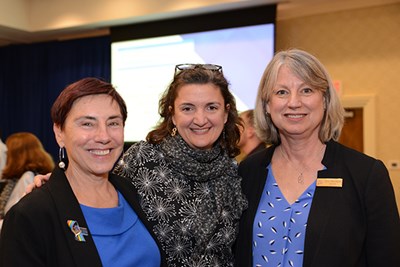 Art and Design Associate Professor Ingrid Hess, center, with Sheila Kirschbaum, right, director of the Tsongas Industrial History Center and co-editor of one of Hess's books, and Paulette Renault-Caragianes, associate dean for health and wellness.