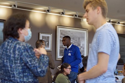 UMass Lowell student speaks to faculty during Honors College mixer