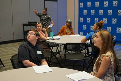 Izzi Giles, vice president of the Accounting Society, and Alana Smith, president of Pi Tau Sigma, learn more about an available event space in University Crossing.