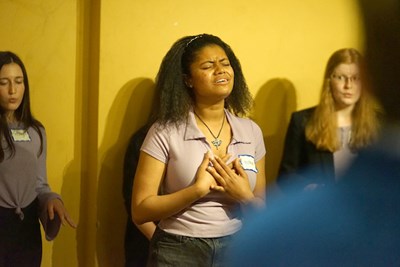 Members of UML's all-female a cappella group The Hawkettes performed at the networking event.