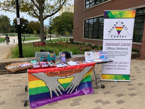 Stonewall Center informational table set up on campus