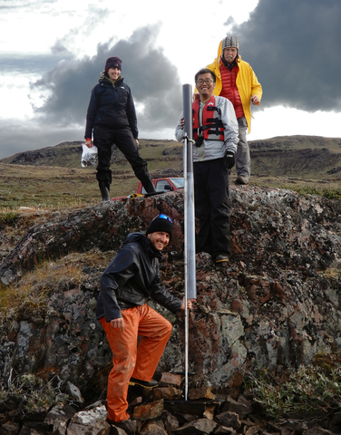 From left to right: Isla Castañeda, Tobias Schneider, Boyang Zhao, Raymond Bradley seen standing on short lake sediment core from Lake SI-102 in southern Greenland