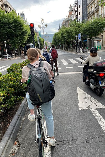 Students bicycling from the international dormitory to Spanish class.