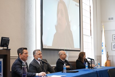 Panelists William Yelle ’85, Gregory Chiklis ’92, Monique Yoakim-Turk ’87, ’88, Kennedy College of Sciences Dean Noureddine Melikechi and Manning School of Business Dean Sandra Richtermeyer answer students' questions during "Where Business Meets Science."