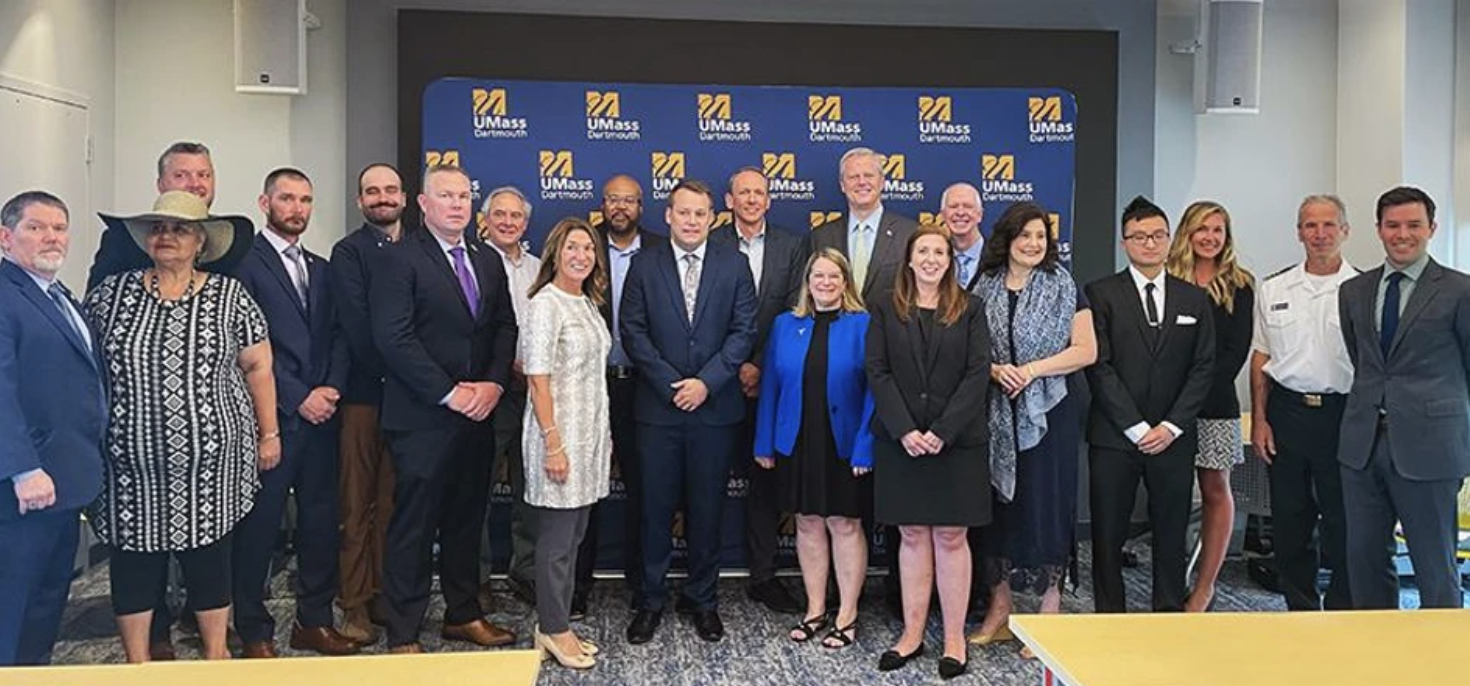 Award recipients from the Benjamin Franklin Institute of Technology, Bristol Community College, Browning the Green Space, Ironworkers Local 7, the Massachusetts Maritime Academy, the Southeastern Massachusetts Building Trades Council, UMass Amherst, UMass Dartmouth, and UMass Lowell gather with Governor Charlie Baker, Lt. Governor Karyn Polito, and MassCEC CEO Jen Daloisio.