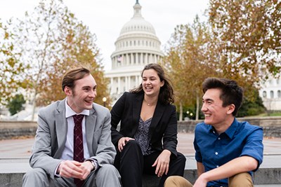 Political science majors Ben Souza and Angela DiLeo and criminal justice major Justin Bouffard on the National Mall