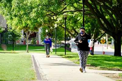 Students take their carryout lunch orders from Rowdy's back to their residence halls on East Campus.