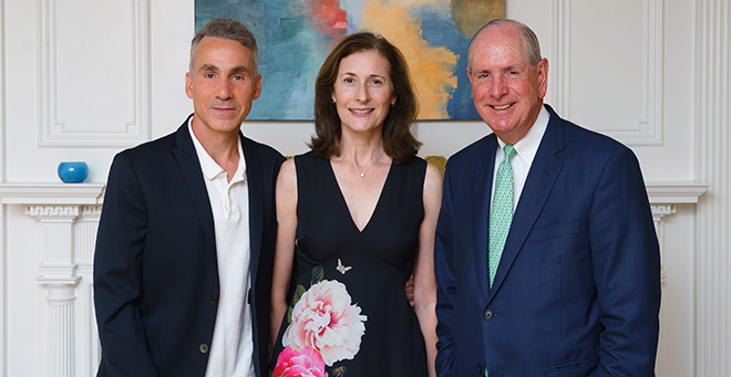 UMass alumni Dan and Diane M. Casey Riccio, PhD, with Chancellor Michael F. Collins in 2021