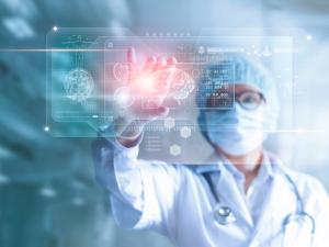 Doctor, surgeon analyzing patient brain testing result and human anatomy on technology