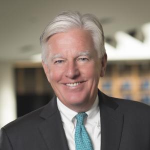 UMass President Marty Meehan smiles 