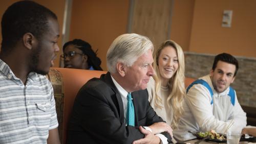 President Meehan speaks with students